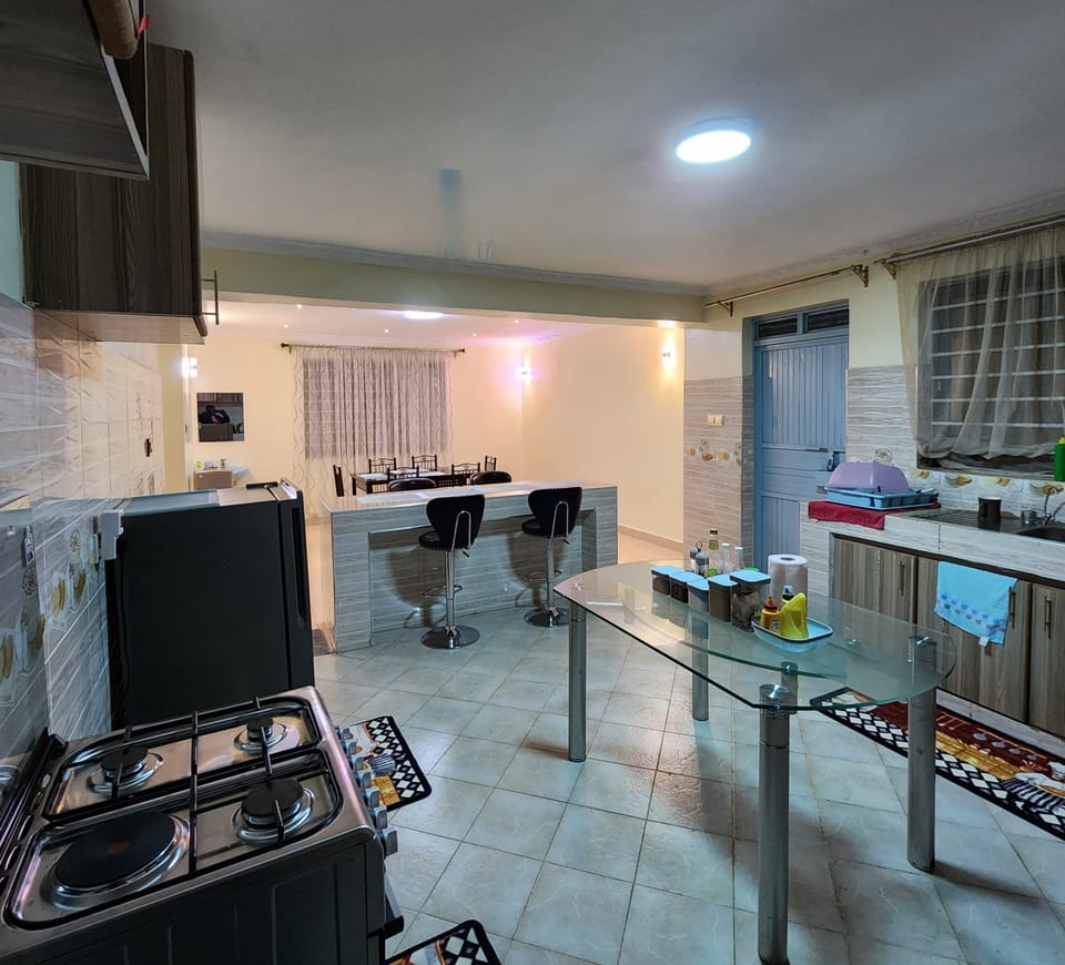 Fridge, microwave, cookware/dishes/utensils