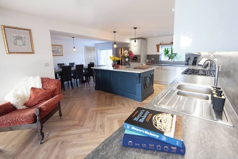 Cook, read, eat, or relax together in our light-filled main living area.