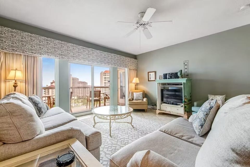 Relax in your elegant living room with plush seating, city views, and a private balcony where you can unwind.