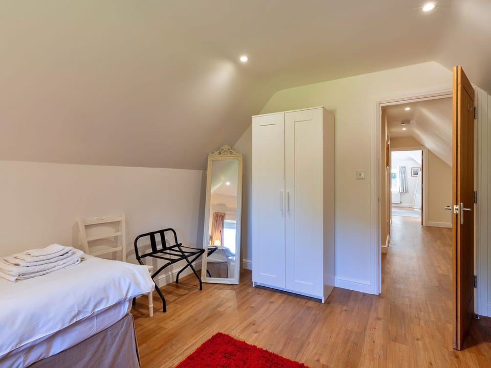 Flooring, Interior Design, Floor, Wood, Furniture, Ceiling, Wood Flooring, Room, Lighting, Bedroom