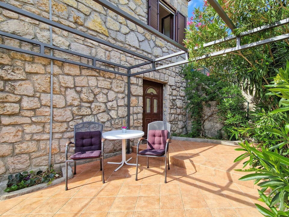 Outdoor Furniture, Flowerpot, Chair, Garden, Shade, Houseplant, Stone Wall, Flagstone, Brick, Patio