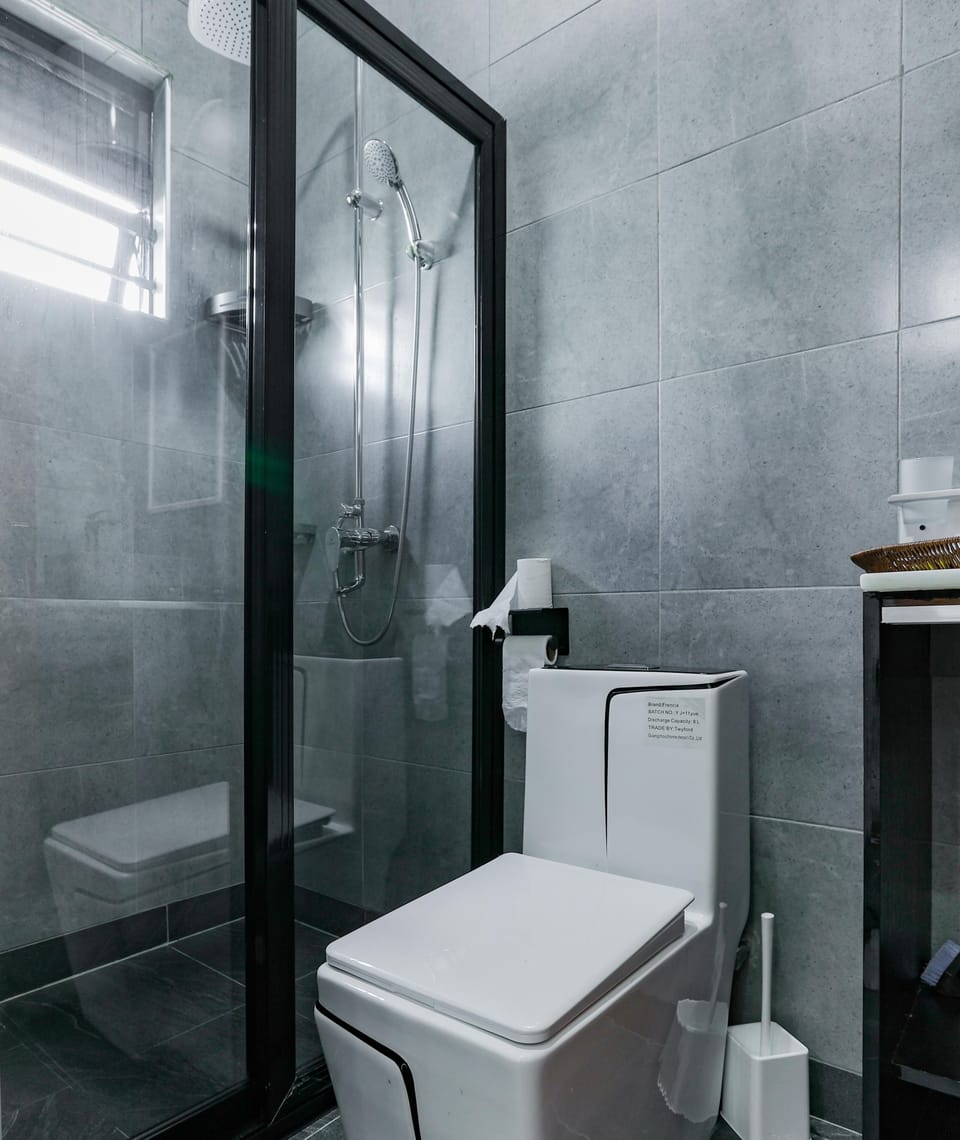 Deluxe Apartment, Hill View | Bathroom | Shower, free toiletries, towels, soap