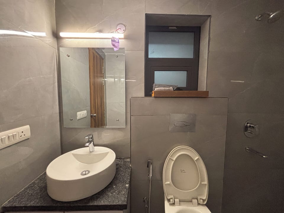 Studio, City View | Bathroom | Shower, free toiletries, slippers, towels