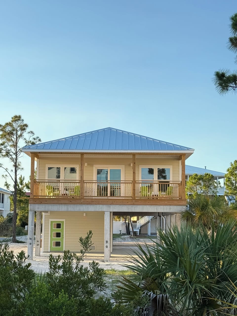 Exterior of the house that looks toward beach