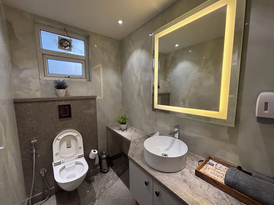 Studio, City View | Bathroom | Shower, free toiletries, bathrobes, slippers
