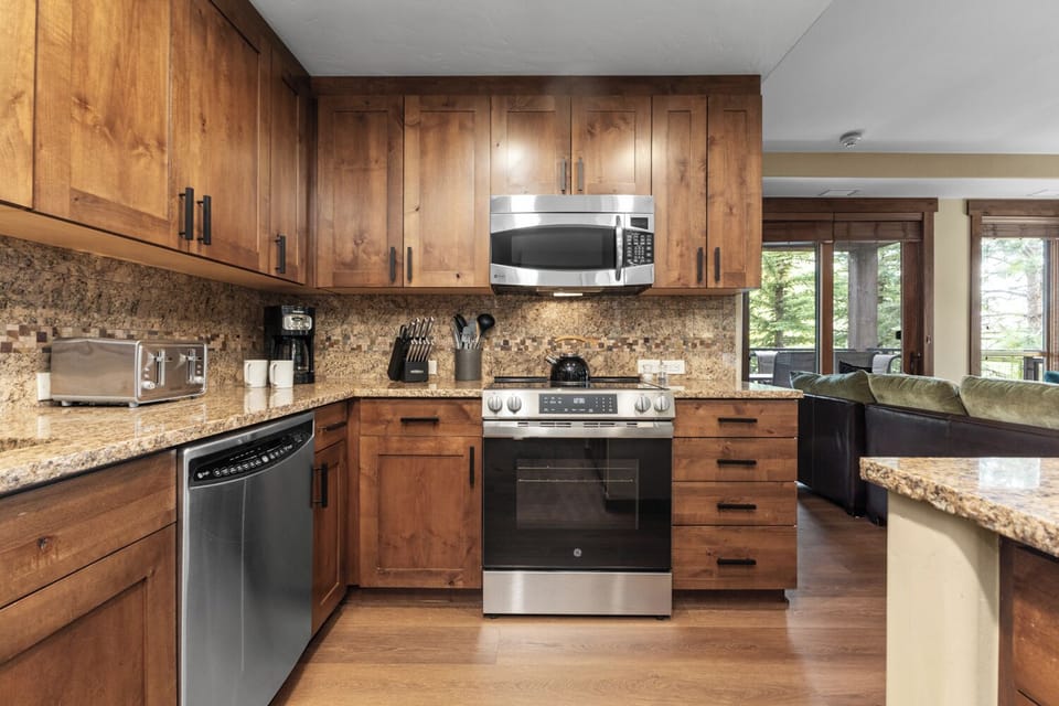 Kitchen with Electric Stove and Microwave