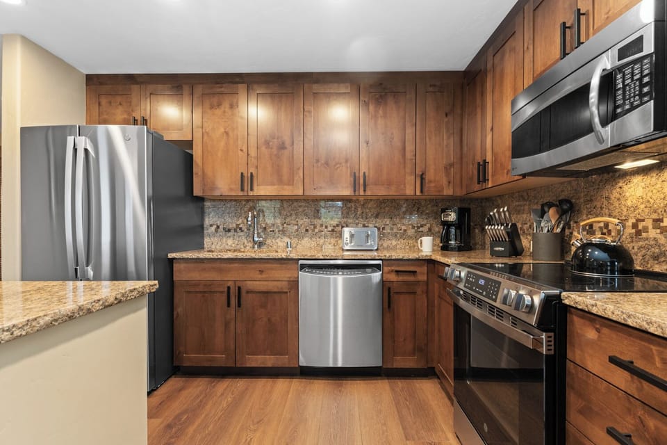 Kitchen with Refridgerator & Electric Stove