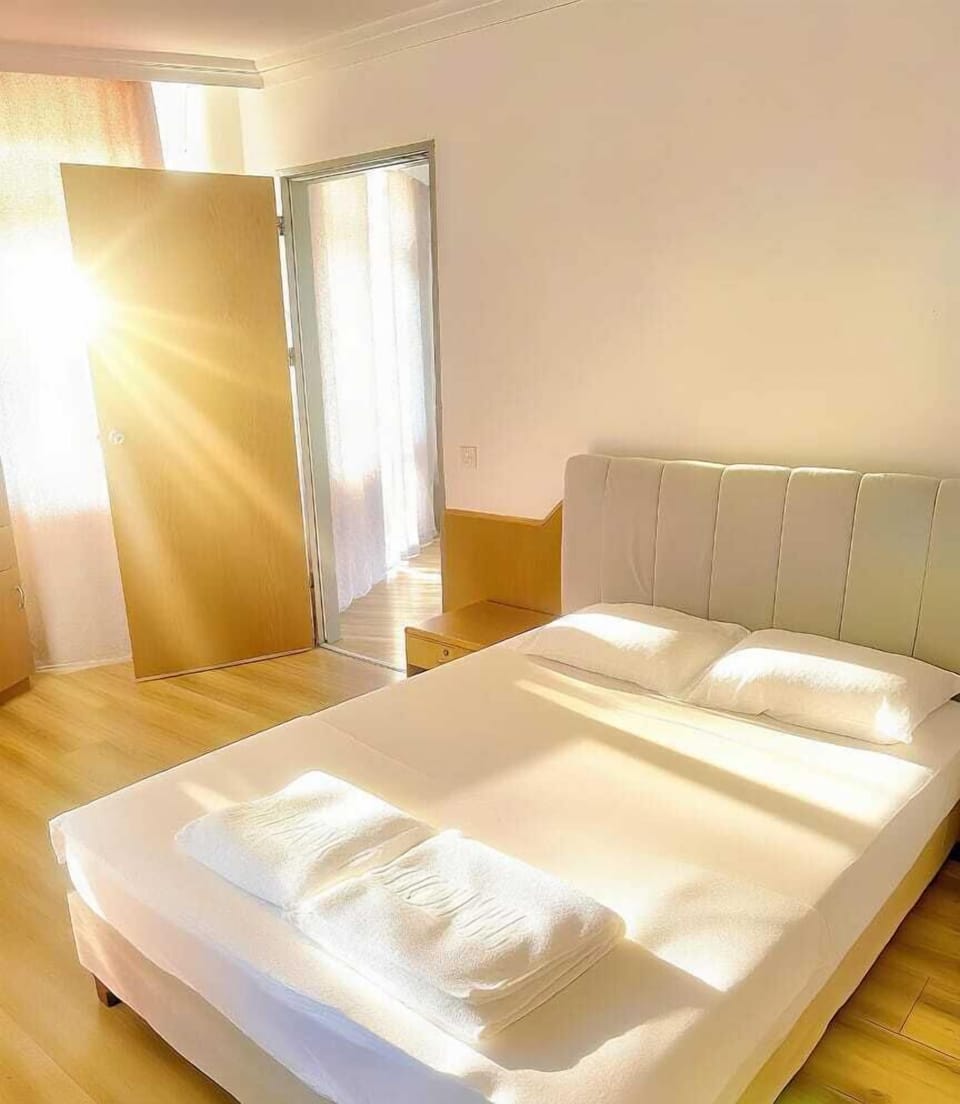 Family Room, Balcony, Sea View | Free minibar, laptop workspace