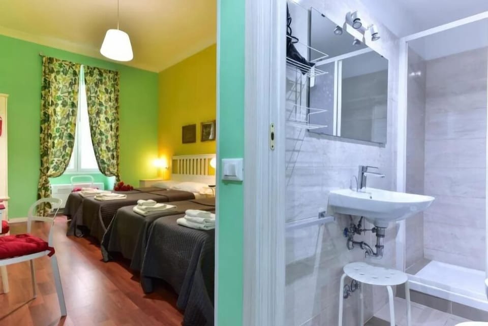 Family Triple Room | In-room safe, desk, laptop workspace, blackout drapes