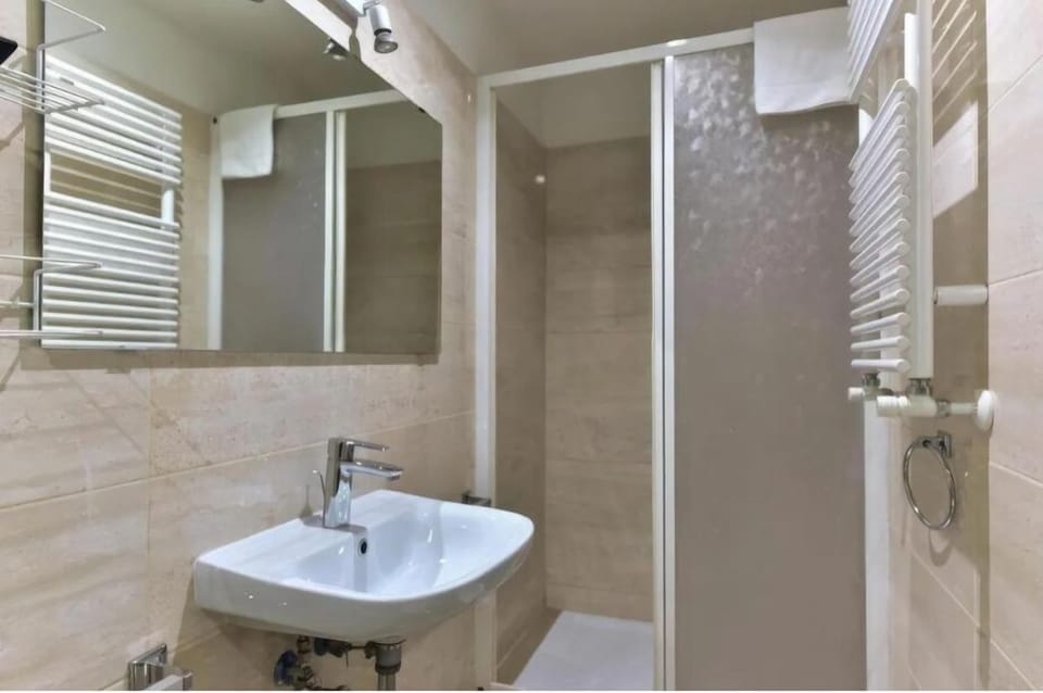 Family Triple Room | In-room safe, desk, laptop workspace, blackout drapes