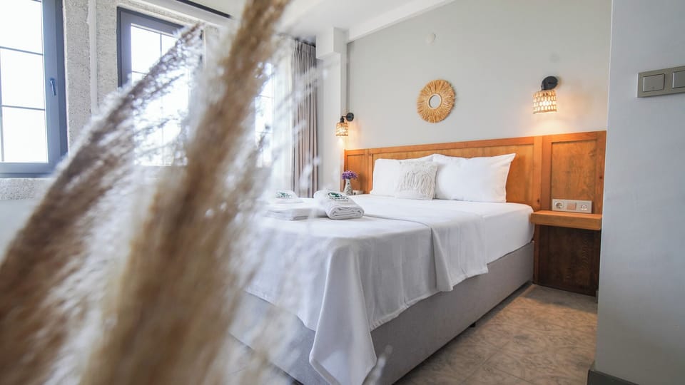 Classic Quadruple Room, Garden View | Laptop workspace, free WiFi