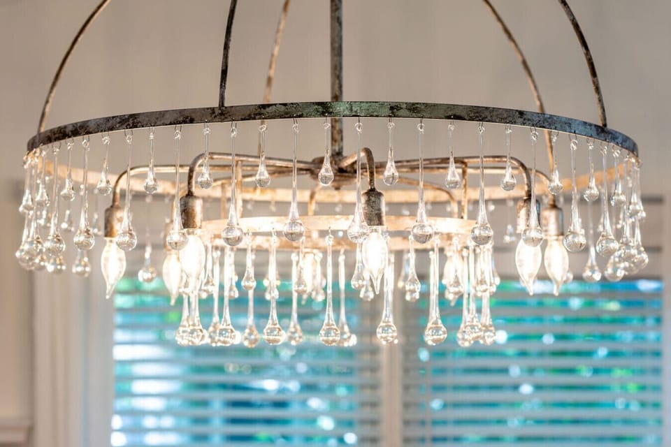 Statement chandelier with elegant crystal drops and warm lighting