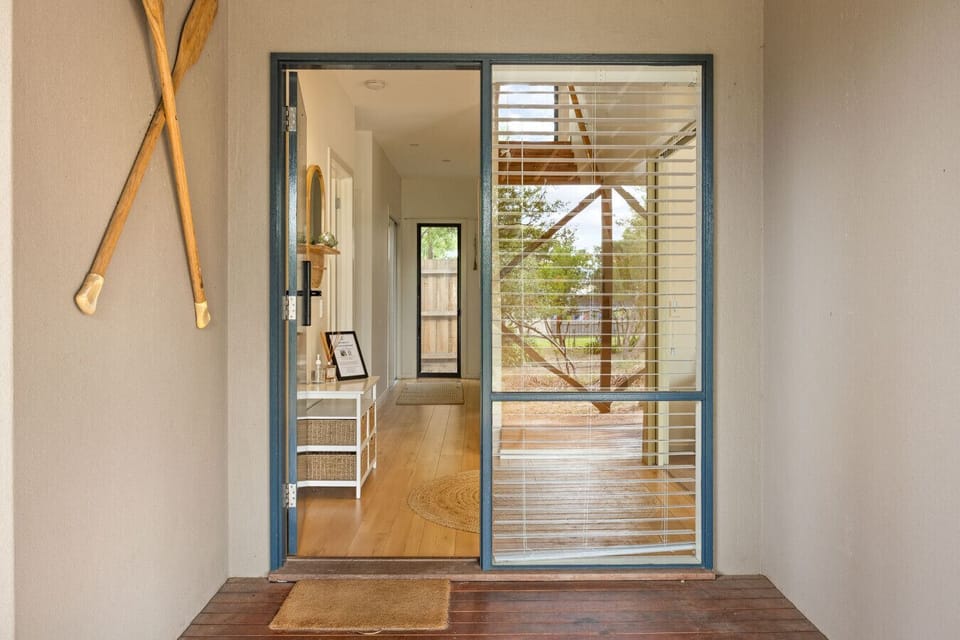 Front door entrance from ground level deck