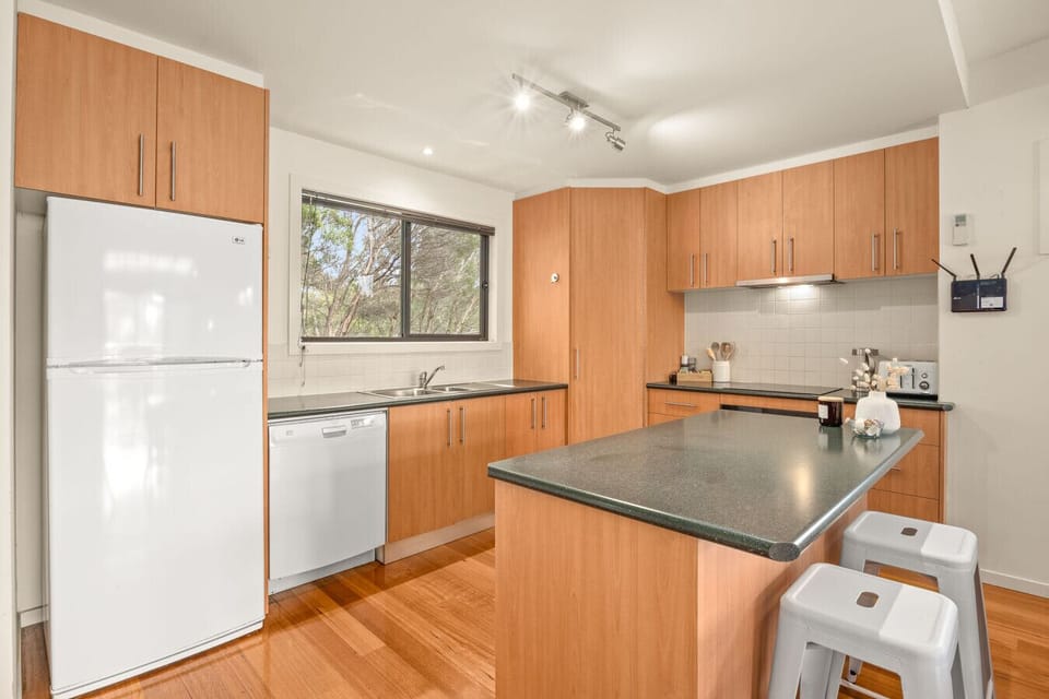 Upstairs Kitchen: With dishwasher, fridge/freezer, microwave, tea,coffee, sugar, milk.