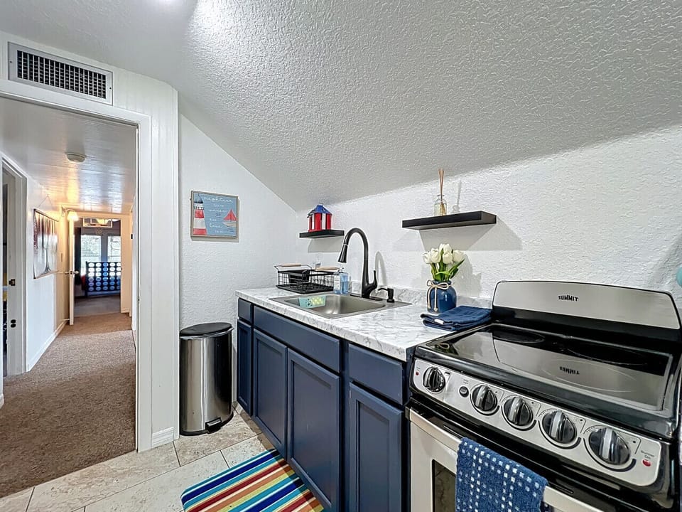 Charming Kitchenette | Compact & Fully Equipped with Stove, Sink & Modern Touches