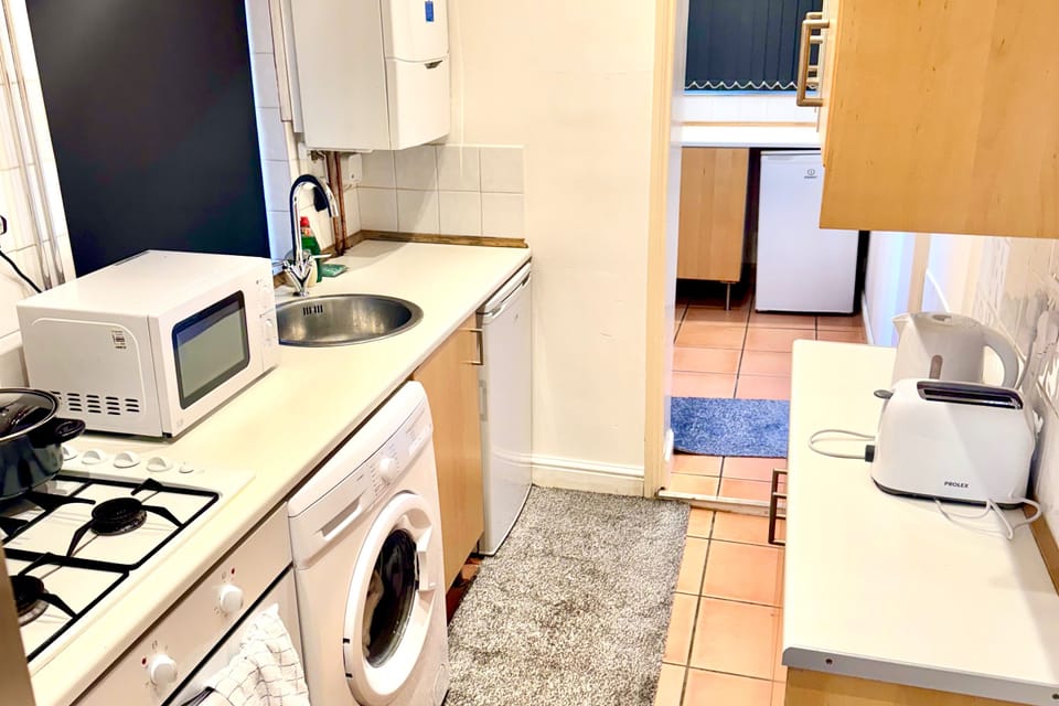 Apartment | Private kitchen | Fridge, microwave, oven, stovetop