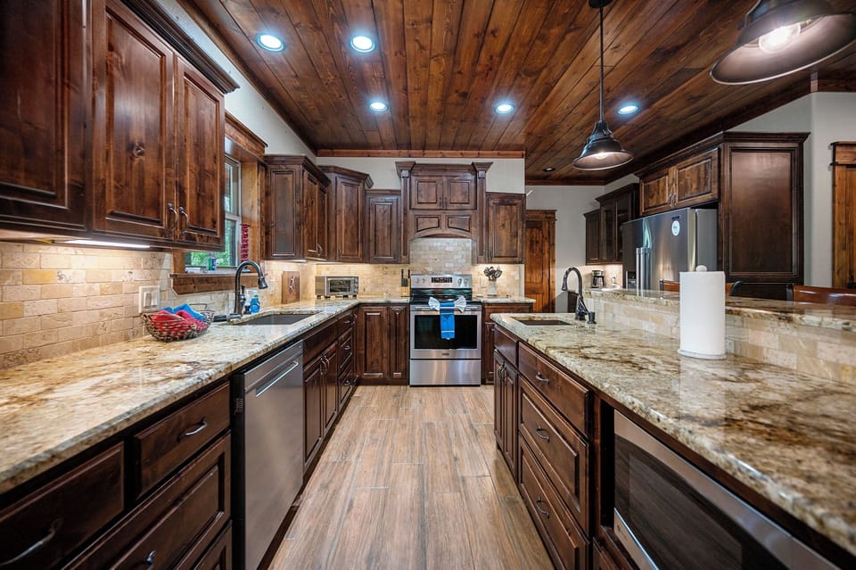 Granite cabinets and stainless steel appliances