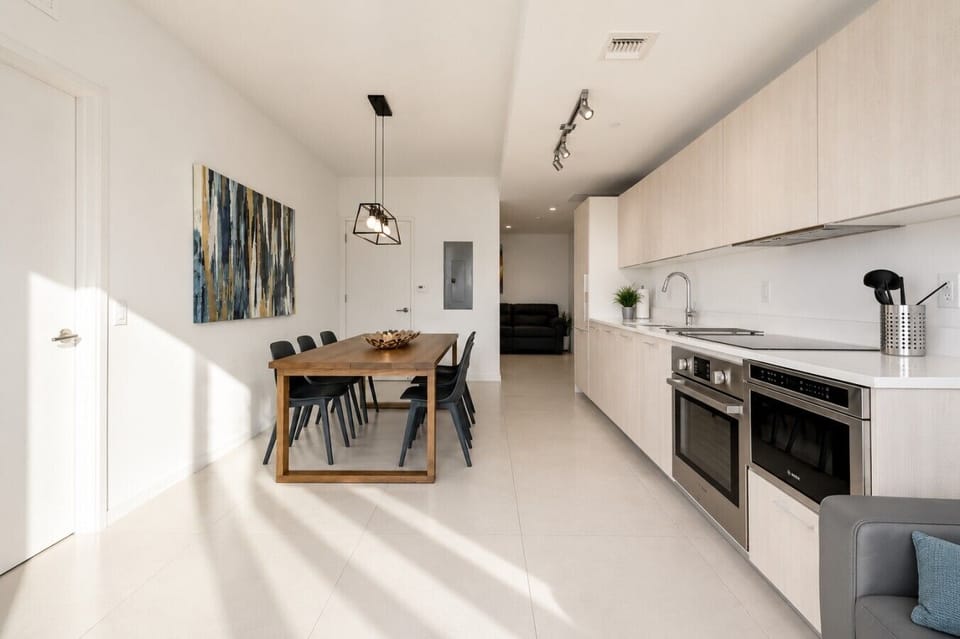 Enjoy a bright, modern kitchen with a comfortable dining space for family meals or casual dinners.