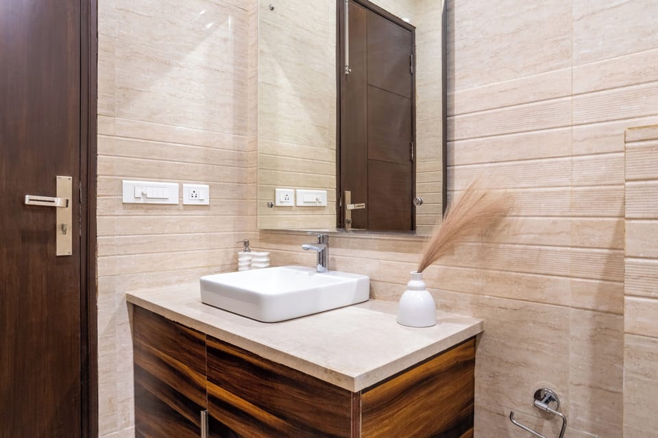 Studio, City View | Bathroom | Shower, free toiletries, slippers, towels