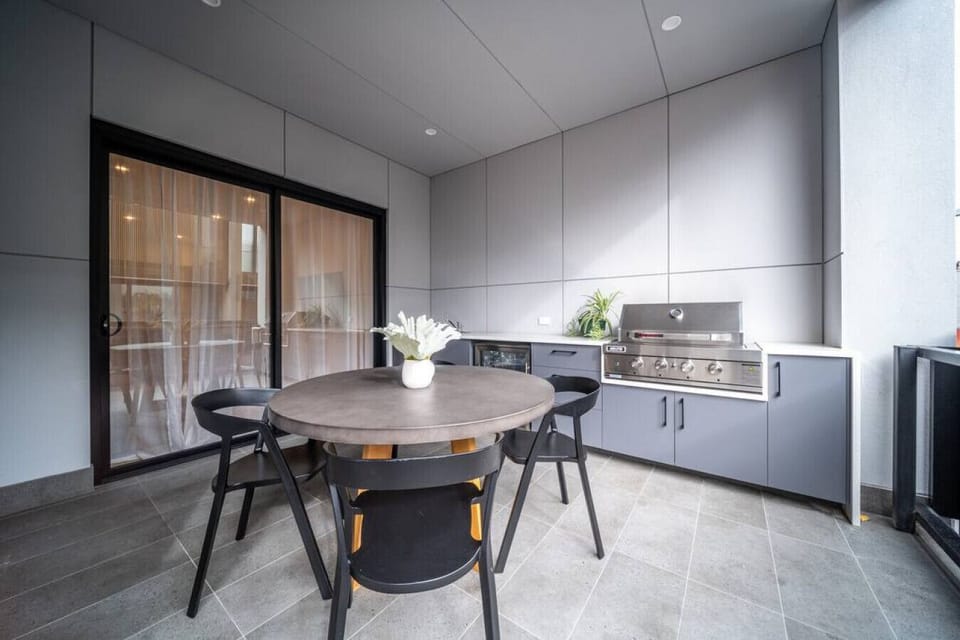 Savour alfresco meals on the main balcony, designed for effortless outdoor entertaining.