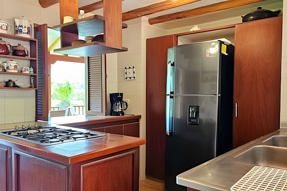Chalet | Private kitchen | Fridge, microwave, cookware/dishes/utensils