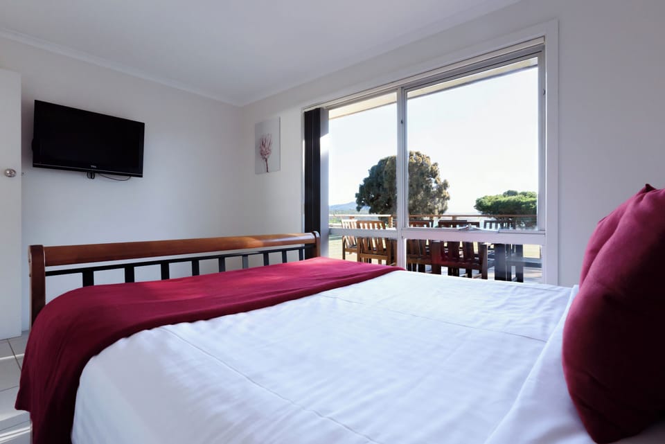 Spacious bedroom with matching decor