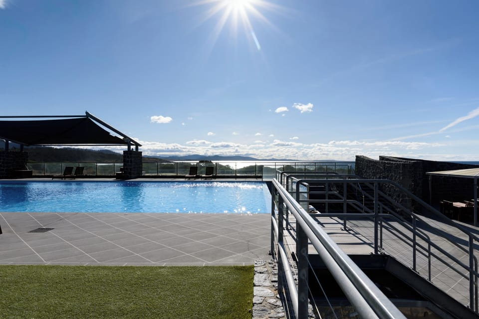 Stylish seating for ultimate poolside comfort - Shared Estate Pool