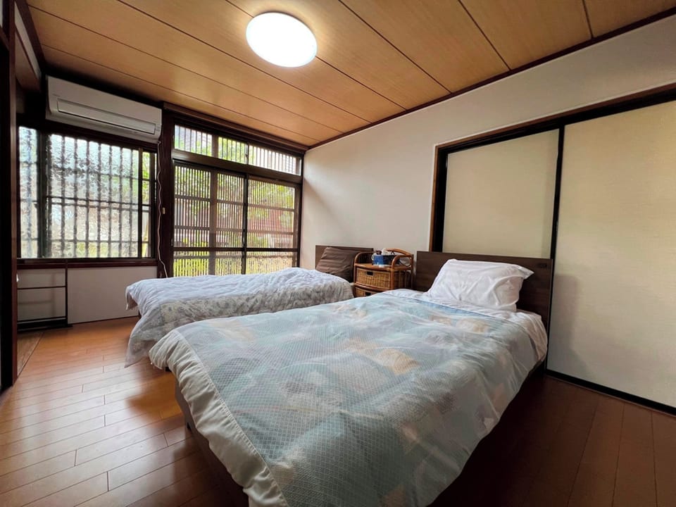 Japanese-style House, Partial Ocean View | Down comforters, desk, laptop workspace, free WiFi