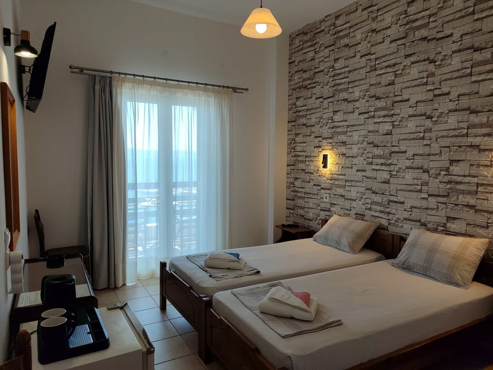 Deluxe Twin Room, Balcony, Sea View | Blackout drapes, soundproofing, free WiFi