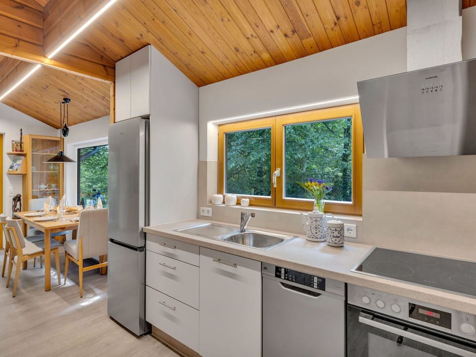 Kitchen, Kitchen Appliance, Countertop, Interior Design, Major Appliance, Flooring, Wood, Ceiling, Home Appliance, Cabinetry