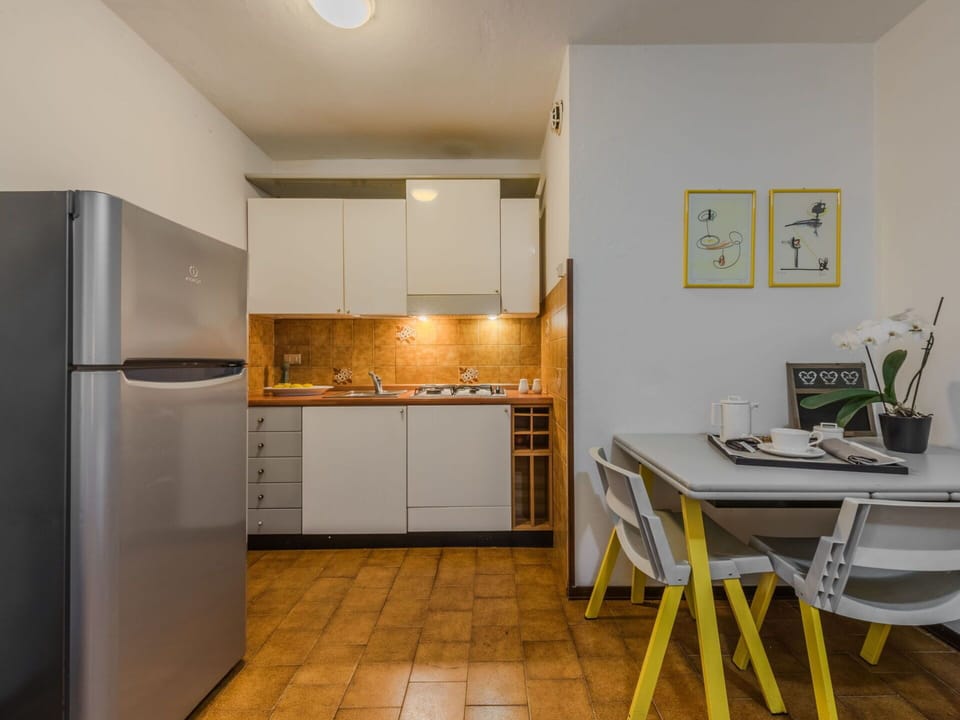 Interior Design, Furniture, Kitchen Appliance, Flooring, Kitchen, Major Appliance, Floor, Wood, Countertop, Room