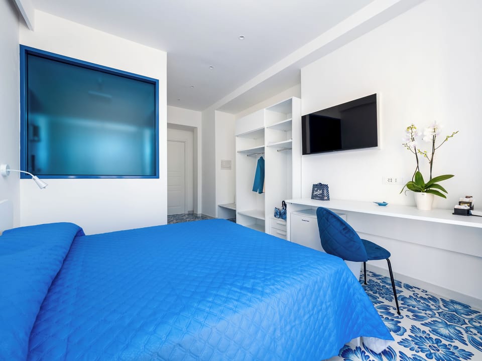 Deluxe Double Room, Balcony, City View | Desk, laptop workspace, free WiFi