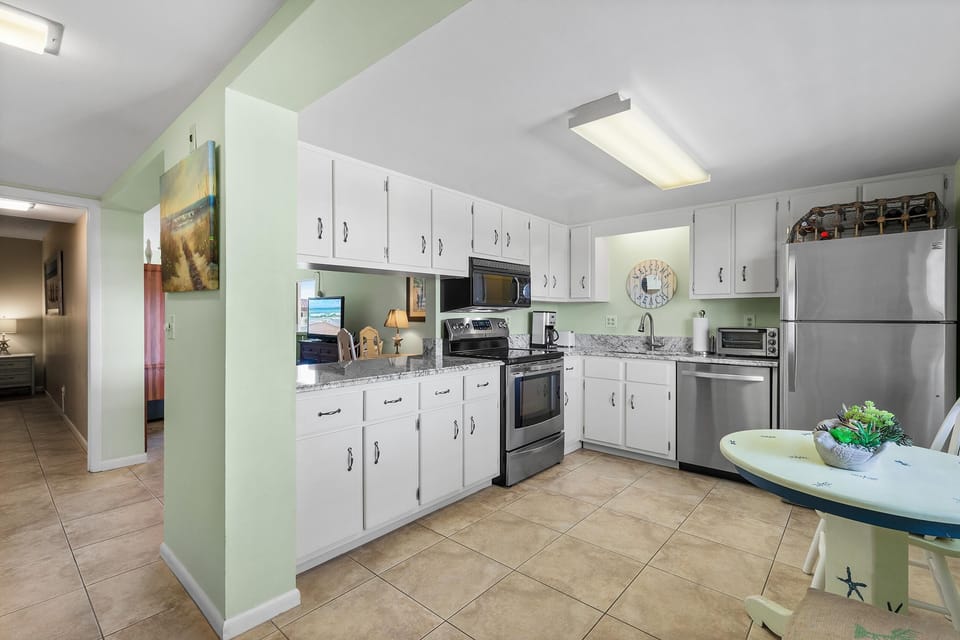 Condo, 1 Queen Bed with Sofa bed (Chateau by the Sea 34B) | Private kitchen | Oven, toaster