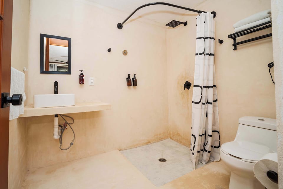 Bright and Ventilated Private Bathroom
Includes eco-friendly product dispensers, softened water system, and everything you need for a refreshing shower.