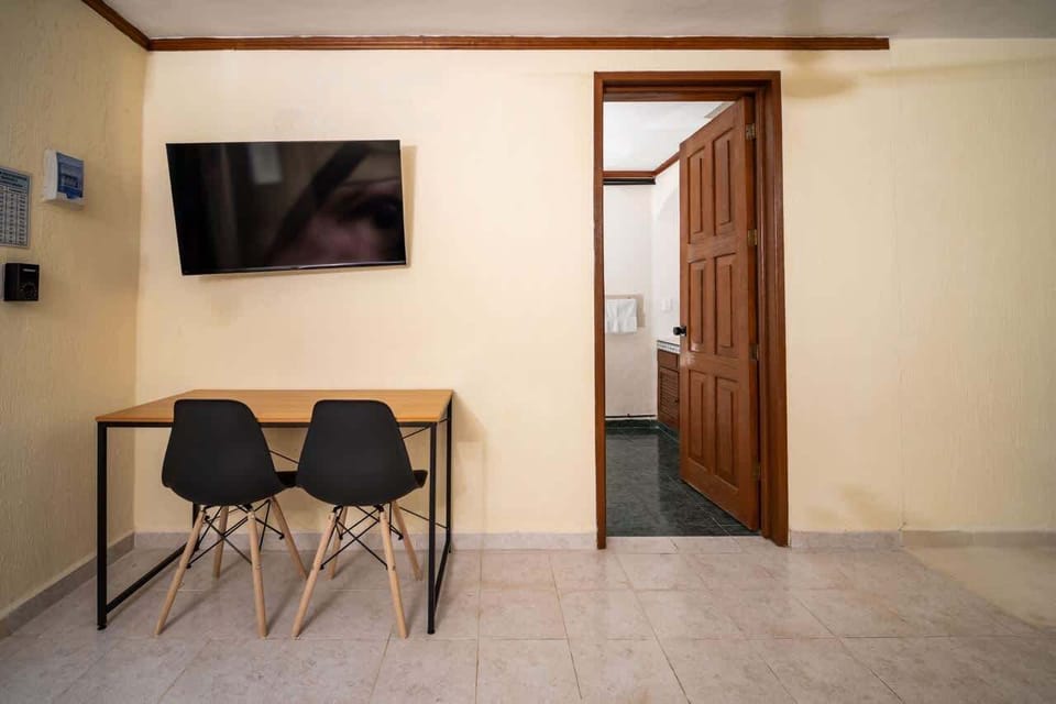 Two chairs — because sometimes work needs company. A great spot to focus, with direct TV or router connection for fast 70 Mbps internet 💻🌐