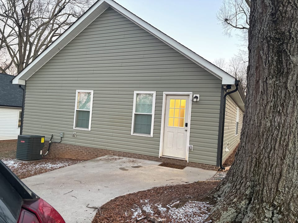 Back of home - where you park car and enter