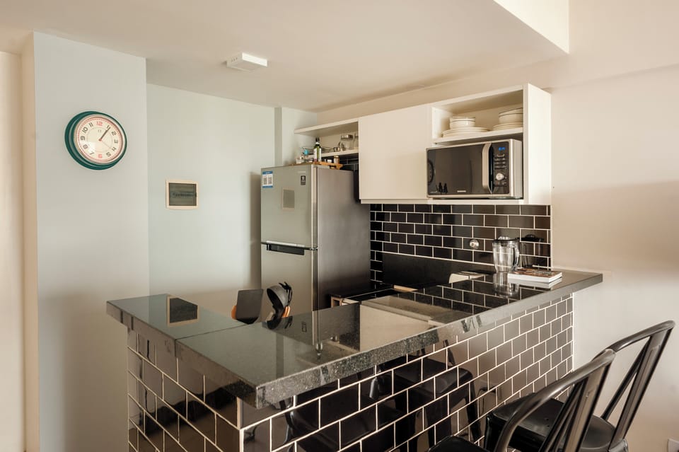 Comfort Apartment, City View | Private kitchen | Microwave, oven, stovetop, coffee/tea maker