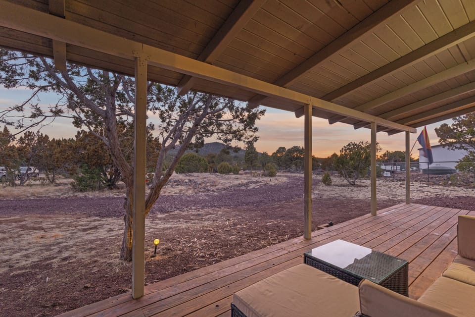 [Front Patio] Enjoy the view of a landscape covered in Juniper trees and Pinion pines!