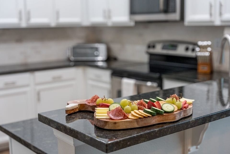 Make your own charcuterie board with the Platters & Boards book we left.