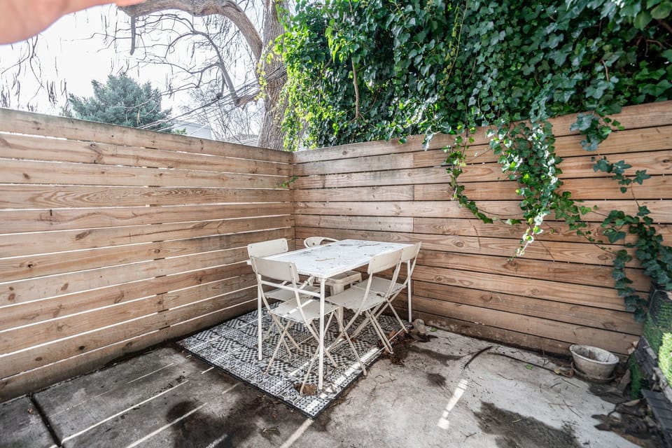 Patio with outdoor seating to enjoy fresh air and a relaxing afternoon coffee.