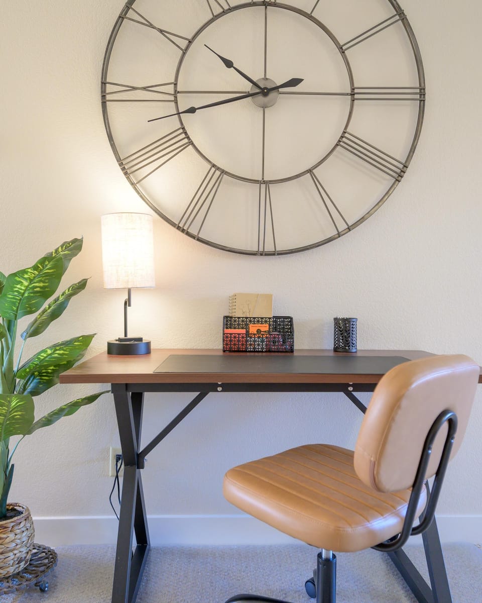 Modern work station with rolling chair.