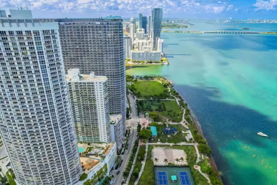 Beautiful aerial view of Biscayne Bay and Margaret Pace Park located just across the street.