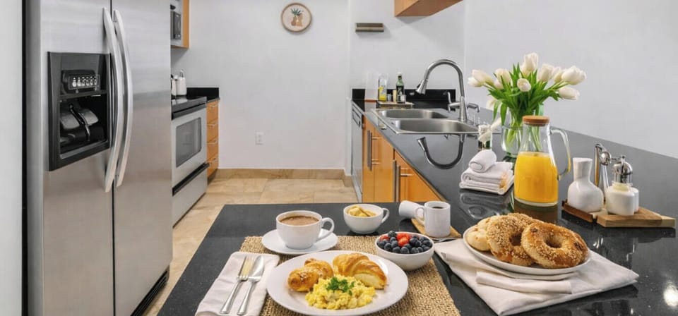 Fully equipped kitchen with coffee maker, modern appliances, and everything needed for longer stays.