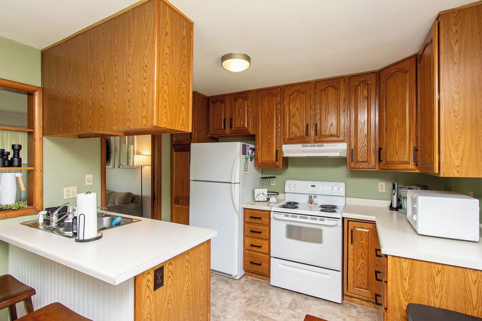 [Kitchen, upstairs] Dishwasher located just around the corner