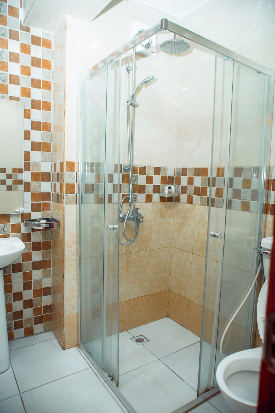 Combined shower/tub, free toiletries, hair dryer (on request), bathrobes