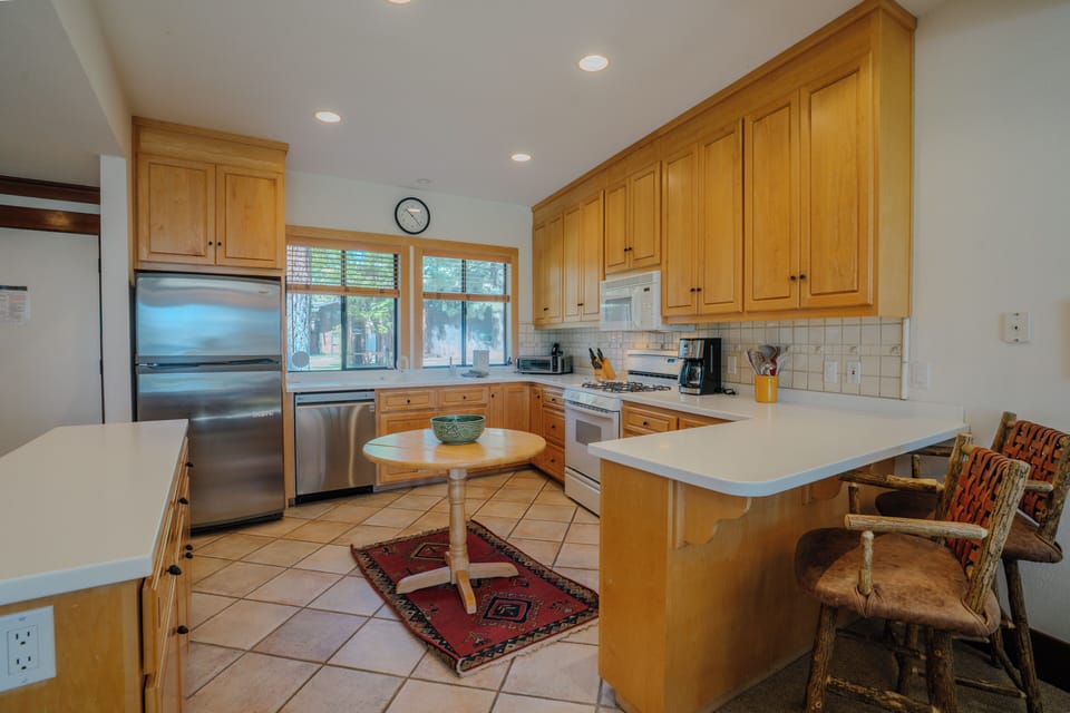 The kitchen comes ready with all your essentials and loads of counter space for any meal