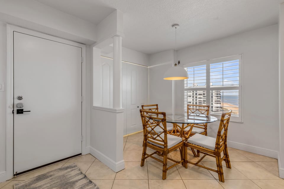 Enjoy the perks of a corner condo with breathtaking ocean views through the dining room window