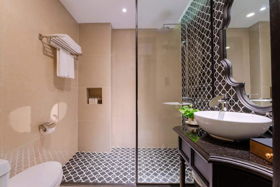 Eco-friendly toiletries, hair dryer, bathrobes, slippers