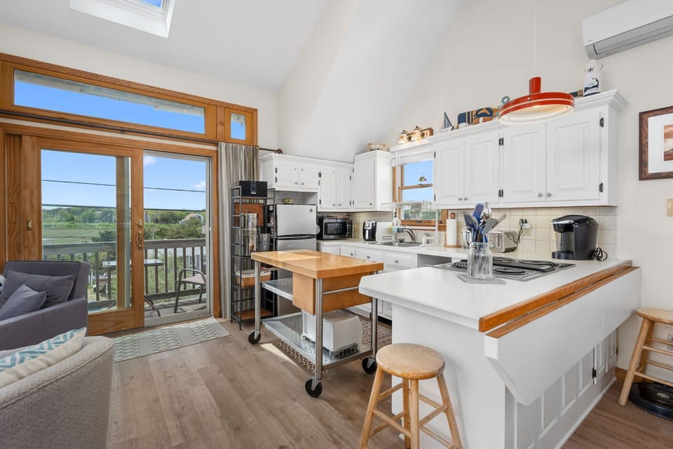Kitchen with sliders to balcony