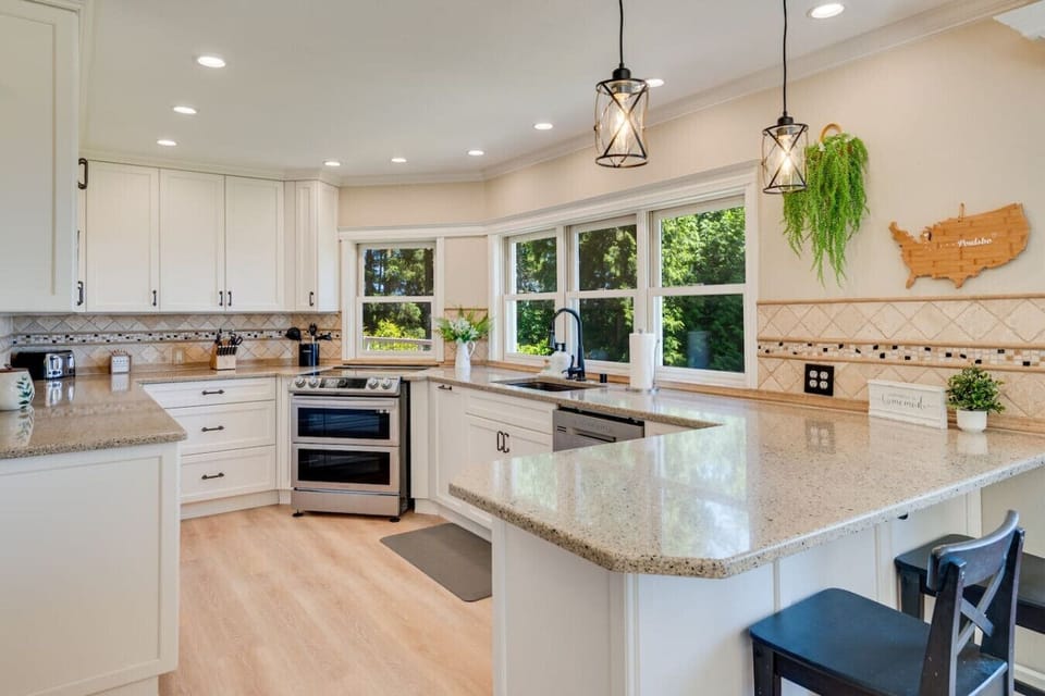 Fully stocked kitchen with stainless steel appliances and everything you need to prepare meals.